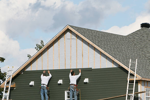 Professional Emergency Siding Repair technician working in Greenville, NY